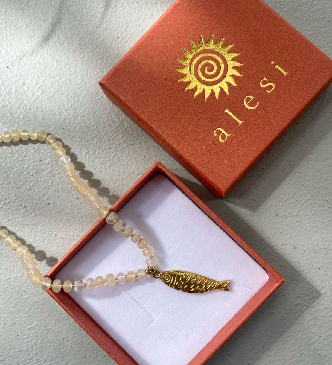 Gold Fish Necklace with Quartz Beads